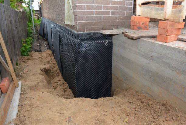 SJ Waterproofing Pros technician performing targeted Waterproofing assessment in Uniondale, IN
